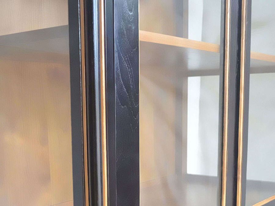 Solid wood grains at the glass door frame