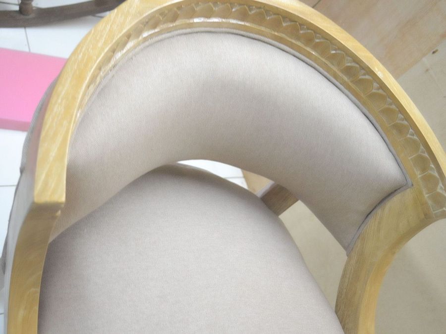 Carving at the seat front apron