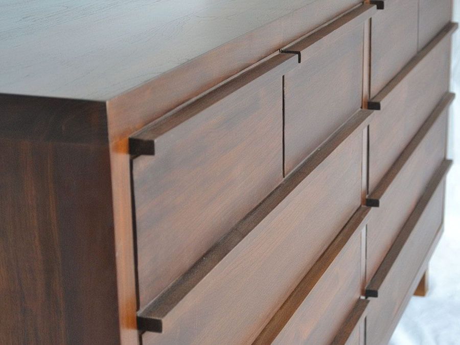Solid wood drawers, 4  drawers on topmost row, 2 drawers on 3 rows.