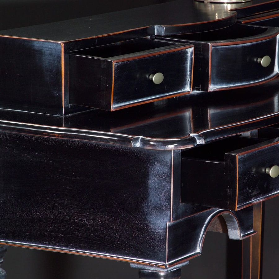 Small drawers on the top leaf of the vintage dressing table 