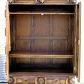 The compartment of the Dutch Flanders paneled armoire door opened