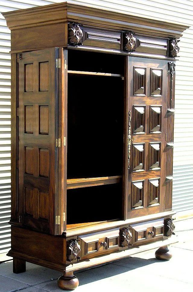 Double hinges door details of Dutch Flanders paneled armoire