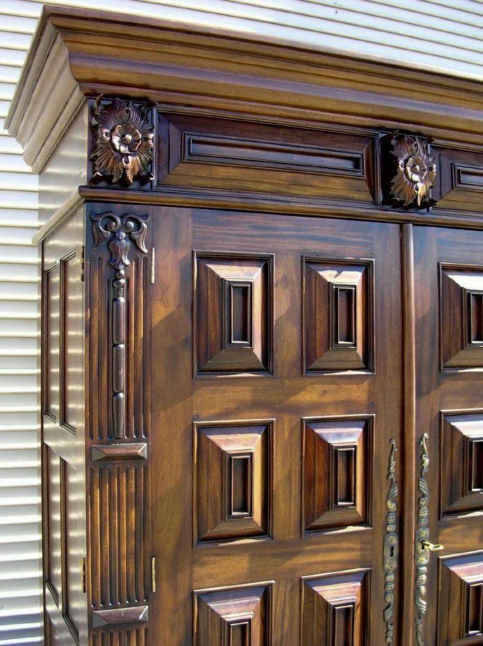 Raised panels detail on the front doors of Dutch Flanders paneled armoire 
