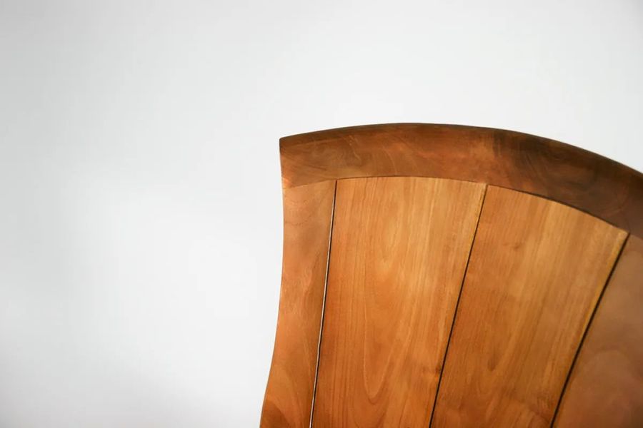 Wooden backrest of the teak dining chair