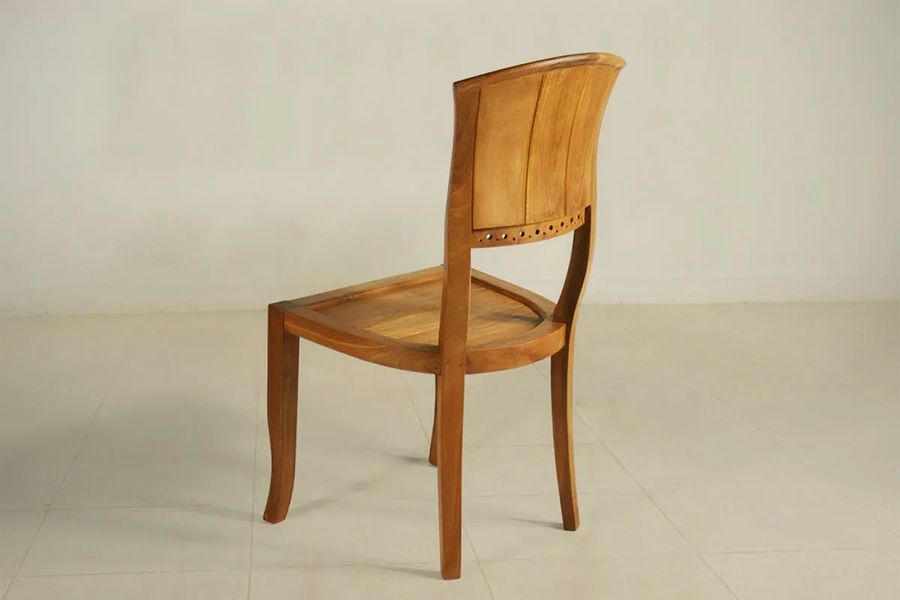 Back side view of the teak dining chair