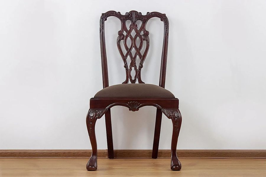 Front side detailed view of the Chippendale ribbon backrest dining chair