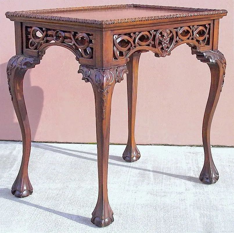 Cabriole legs ball and claws carving