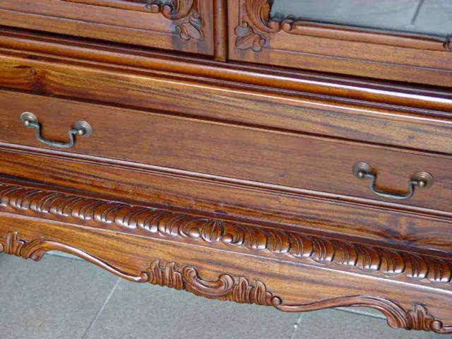 Large drawer detail under the glass doors of Chippendale vitrine