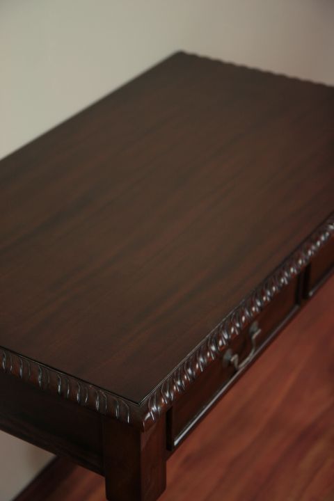 Solid wood top leaf detail of the colonial console table