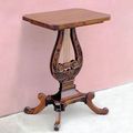 Lyre accent table made of mahogany wood