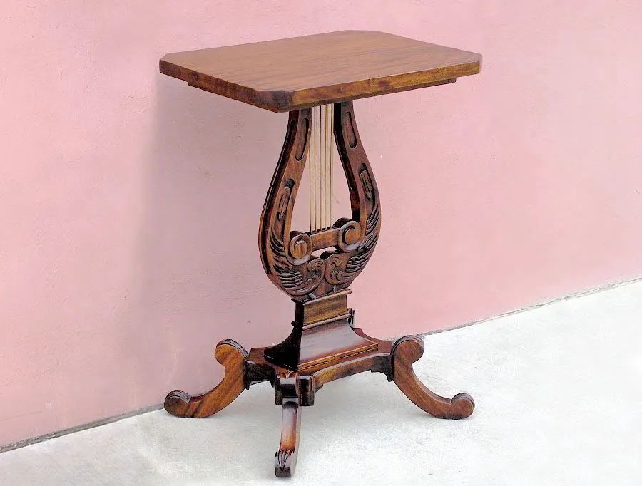 Lyre accent table made of mahogany wood