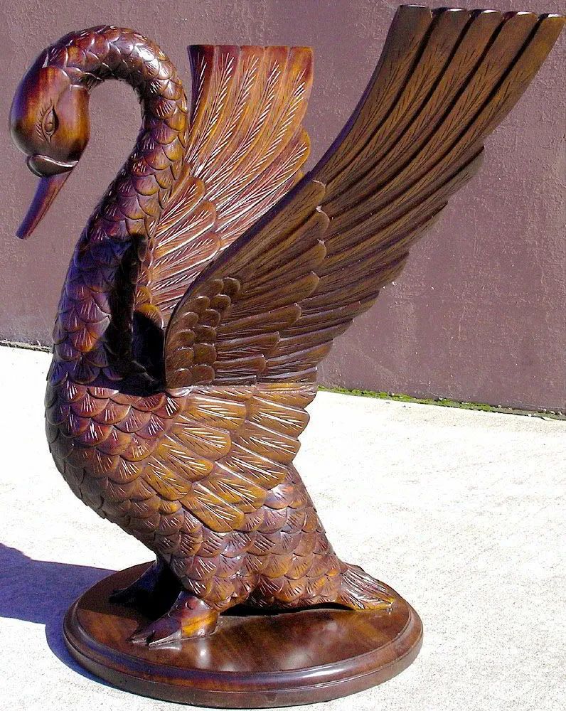 Swan statue base round table