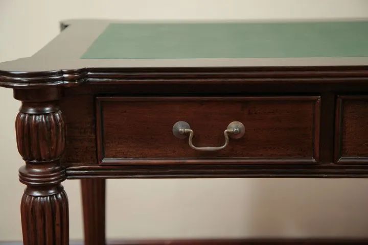 Bead edge decoration on the front drawer of Sheraton writing table
