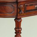 Carving details of the fluted legs console