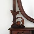 Oval mirror detailed view of Victorian bedroom vanity