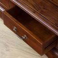 Dovetailed drawers pulled out on the base of the Victorian bookshelf