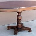 Pedestal table extended to oval shape top