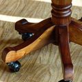 Spread legs and casters of the Victorian swiveled chair
