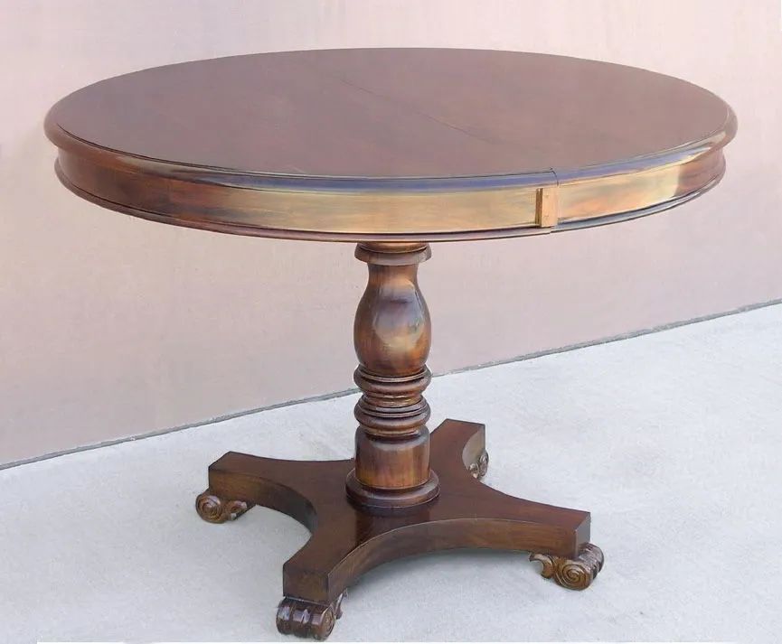 Pedestal round table extendable top