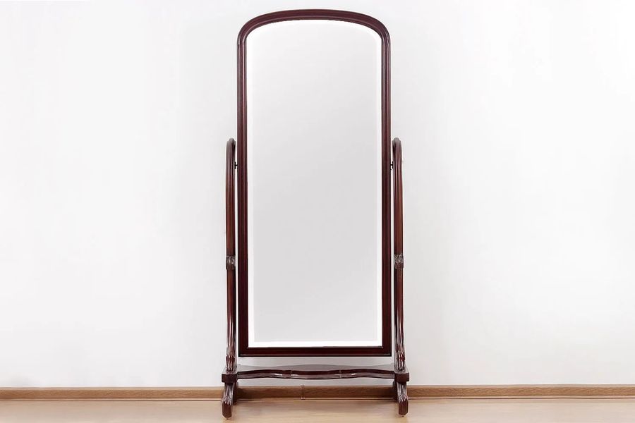 Front view detail of Victorian swiveled mirror mahogany wood frames