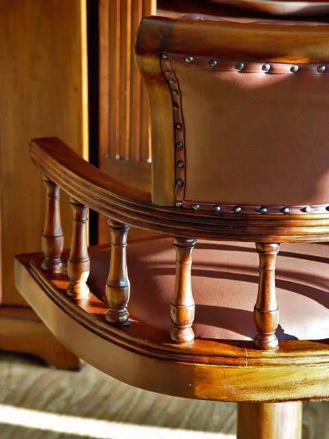 Back side detailed view of Victorian swiveled office chair