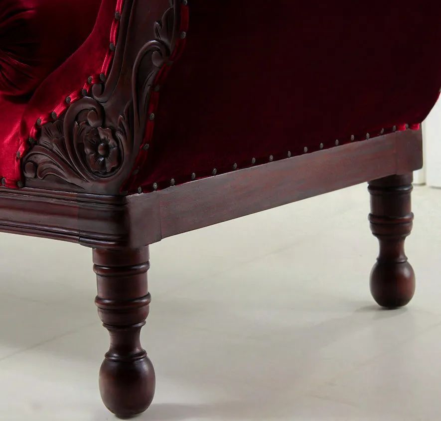 Colonial large sofa mahogany wood bun feet detail