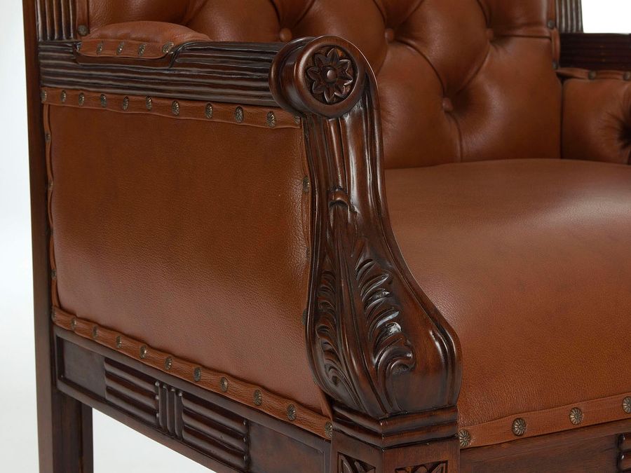 Wood carving on the arm rest of librarian chair