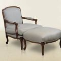 Louis XV bergere in classic mahogany finishes with gray fabric upholstery