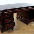 The doors and drawers of the Louis XV partner desk pulled out
