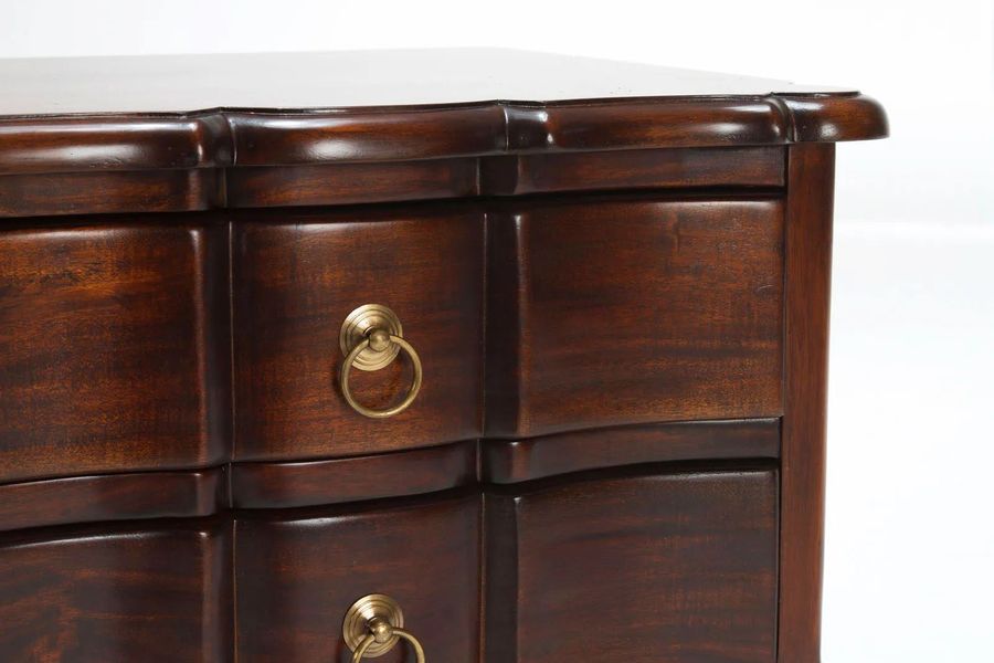 Ring plate pulls accented the front drawers