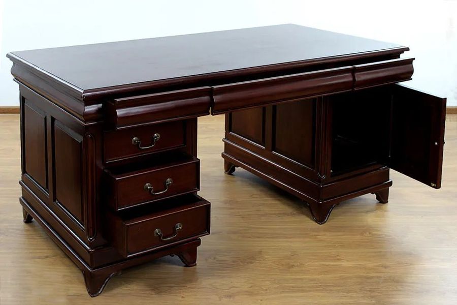 The doors and drawers of the Louis XV partner desk pulled out