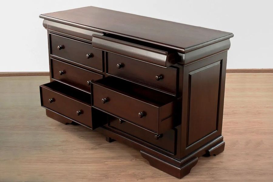 Dovetailed drawers of Louis XV dresser pulled out