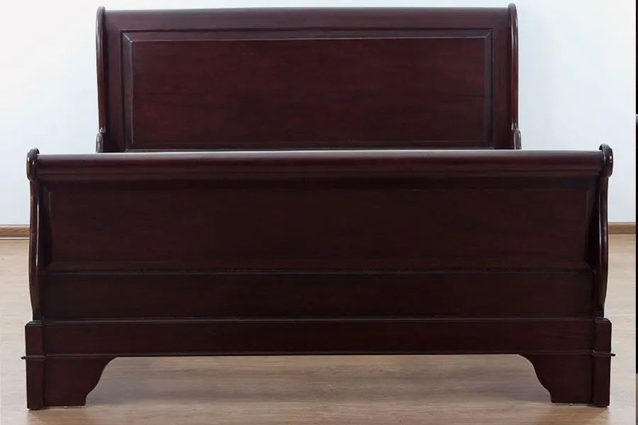 Solid wood raised panels on the headboard of Louis XV Sleigh bed 
