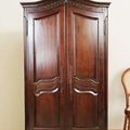 Front side view of the French classic bonnet top armoire 