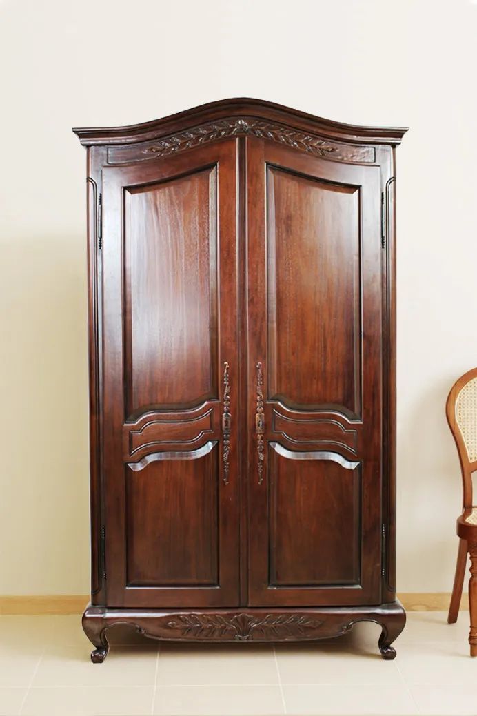 Front side view of the French classic bonnet top armoire 
