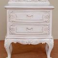 Front side detail of white painted rococo nightstand
