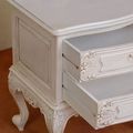 White painted drawers detail of Rococo nightstand