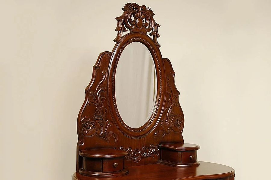 Wood stained mirror frame detail