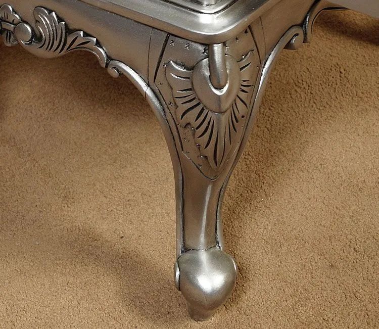 Silver leaf gilt on flower carving knee