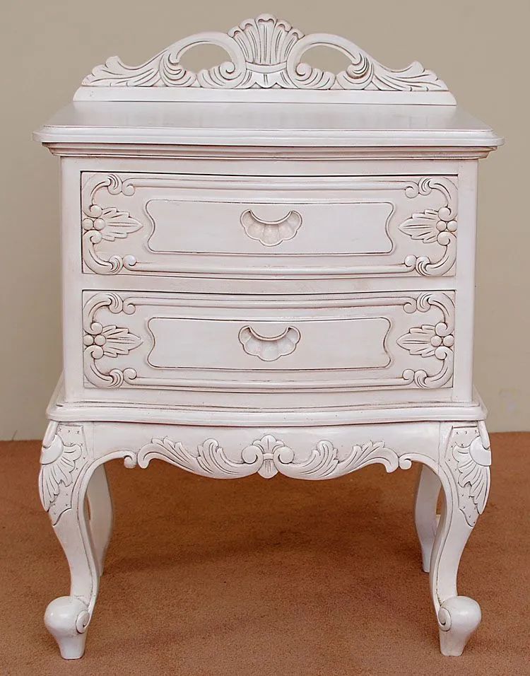 Front side detail of white painted rococo nightstand