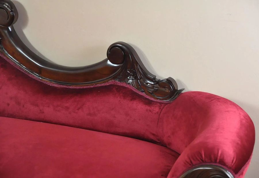 Right end detail of Rococo red velvet sofa