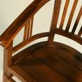 Wood seat detail of the Batavia teak wood armchair