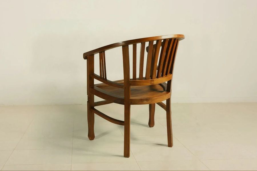 Back side detail of the Batavia teak wood armchair
