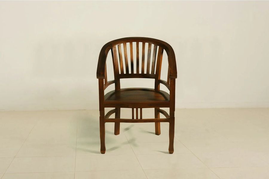 Front side details of the Batavia teak wood armchair