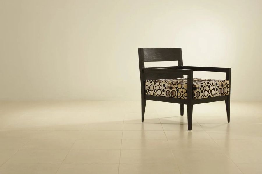 Tapered legs mahogany easy chair circular pattern fabric