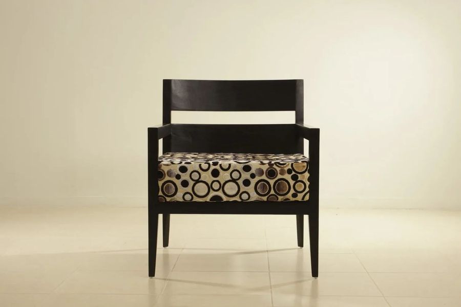 Tapered legs mahogany easy chair front view