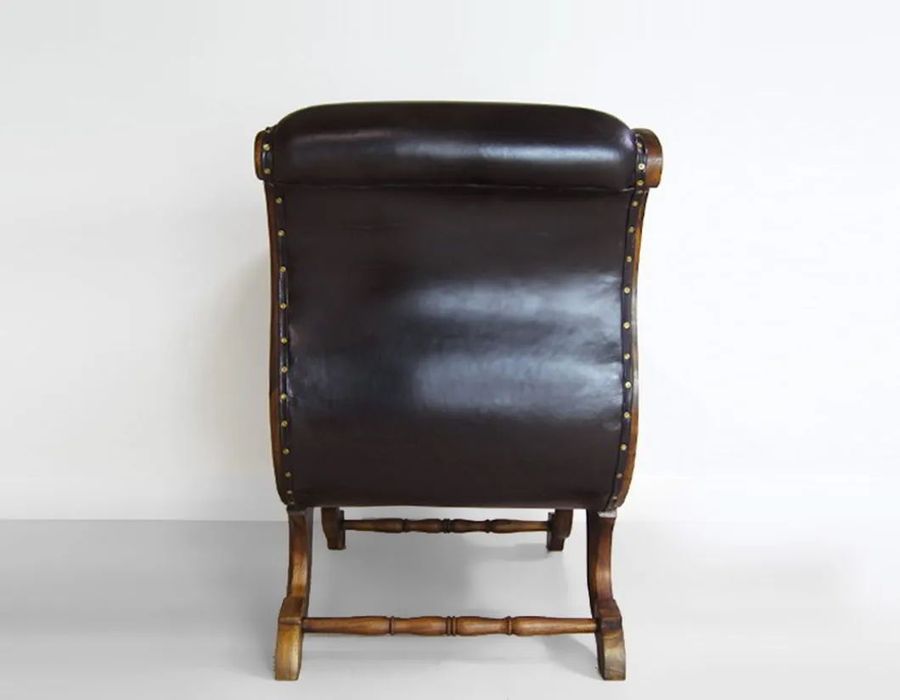 Upholstery detail on the out side of Teak leather lounge chair