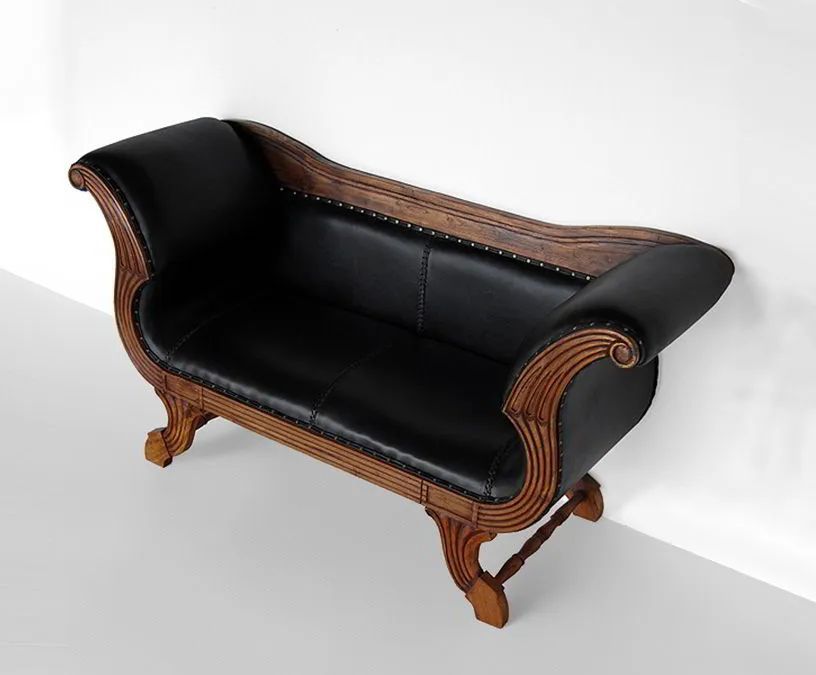 Leather upholstery detail of the Teak leather loveseat