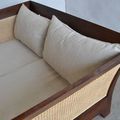 The seat detail of the teak rattan sofa