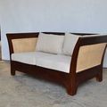 The teak rattan sofa dark brown finish and natural rattan